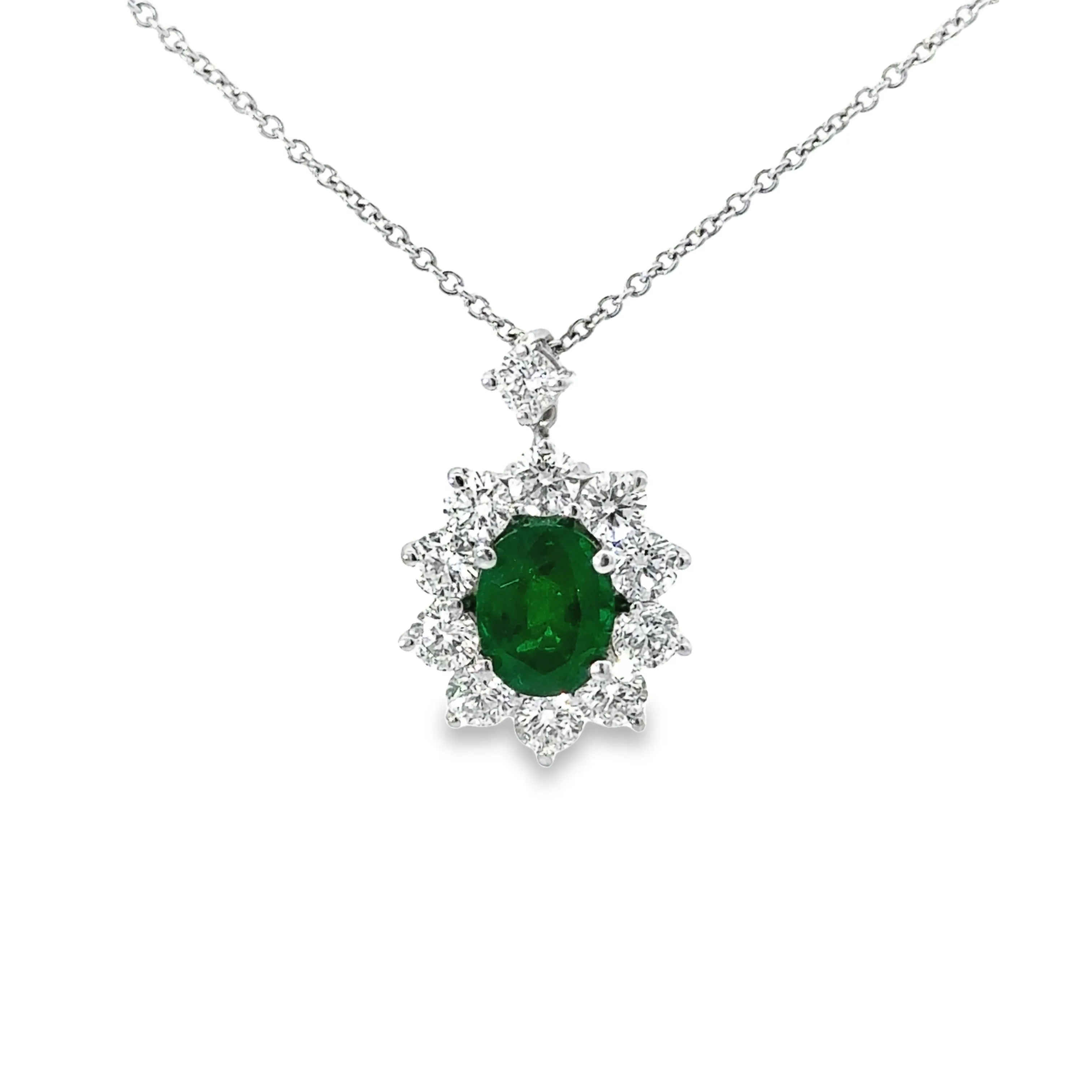 18k White Gold Emerald And Diamond Halo Pendant