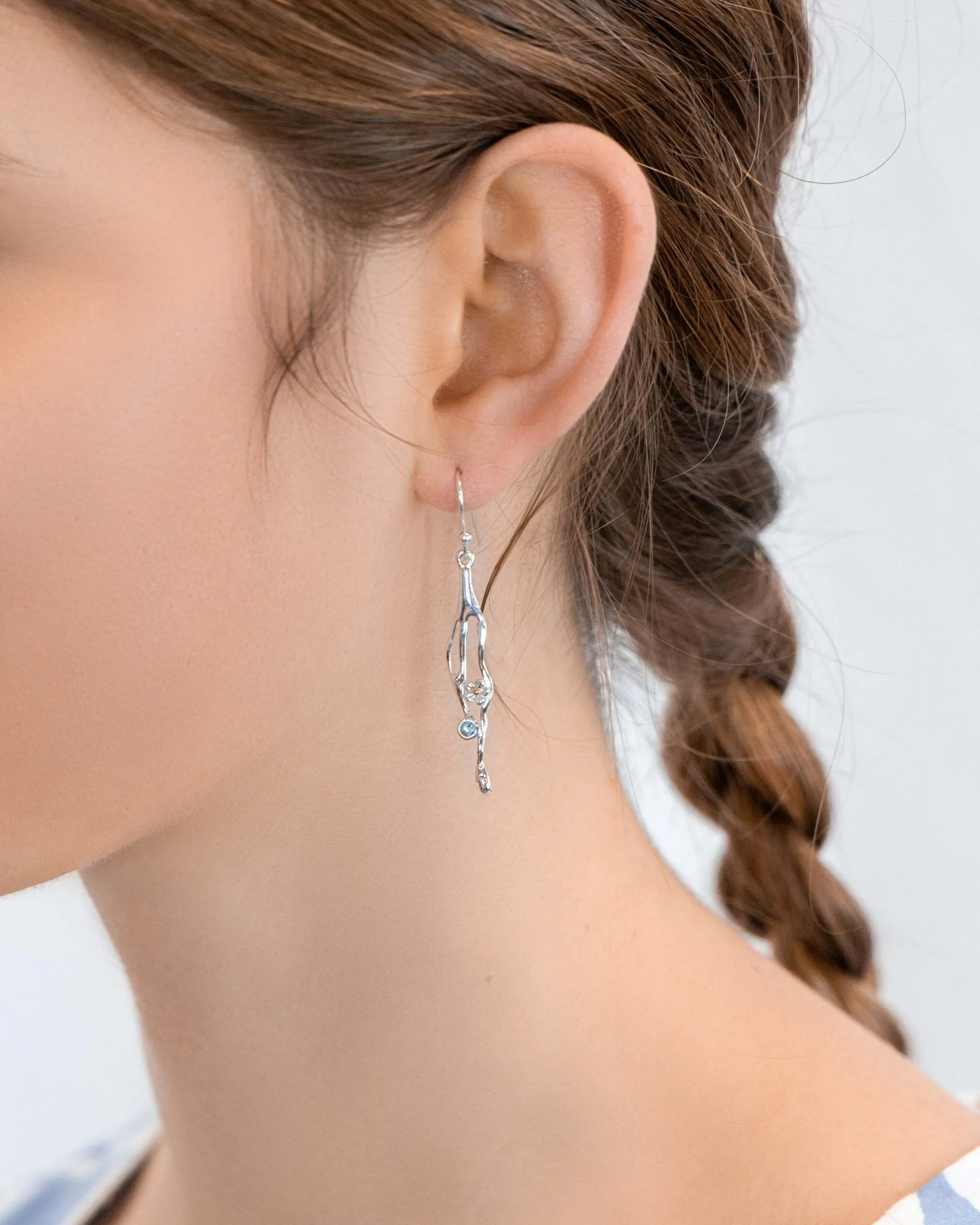 Banyan Flower and Blue Topaz Dangle Earrings