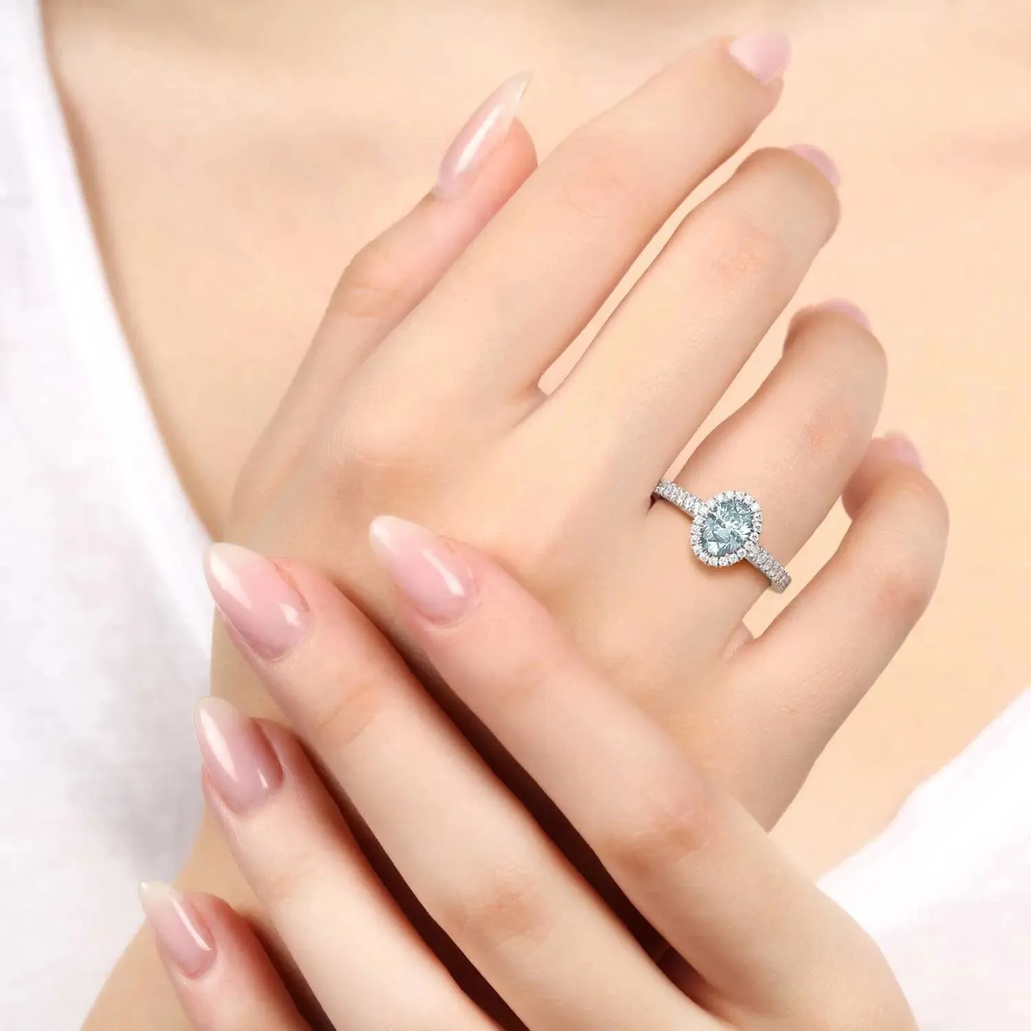 Classic Oval Aquamarine Halo Ring in Sterling Silver