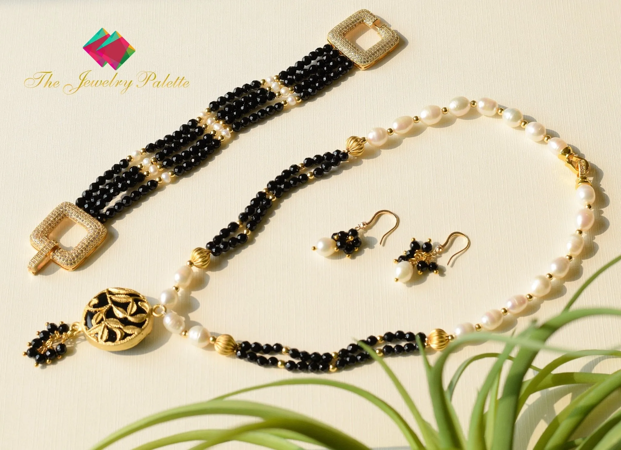 Deena luxe black onyx and white pearl multitiered bracelet