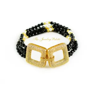 Deena luxe black onyx and white pearl multitiered bracelet