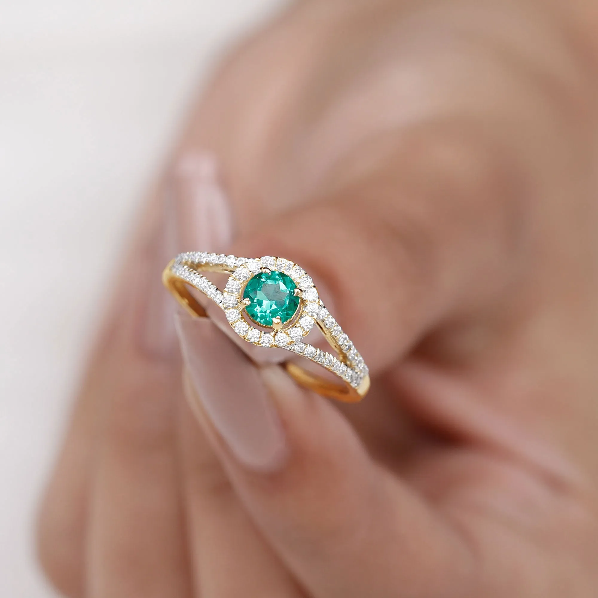 Lab Grown Emerald and Diamond Halo Engagement Ring in Split Shank