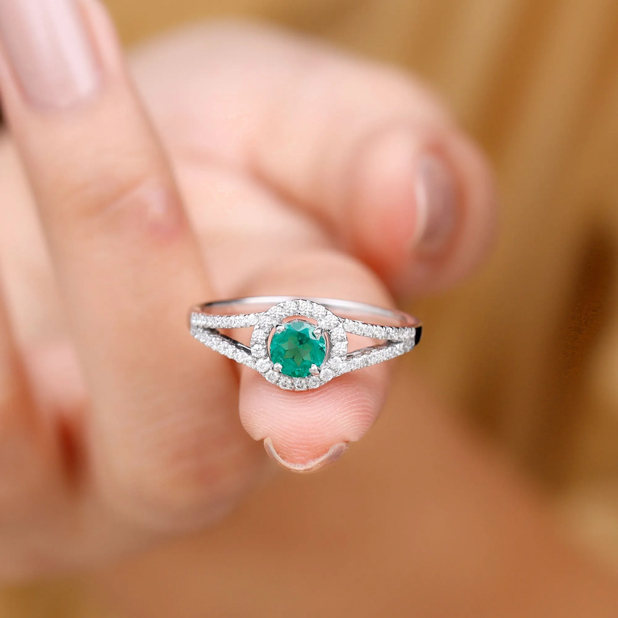 Lab Grown Emerald and Diamond Halo Engagement Ring in Split Shank