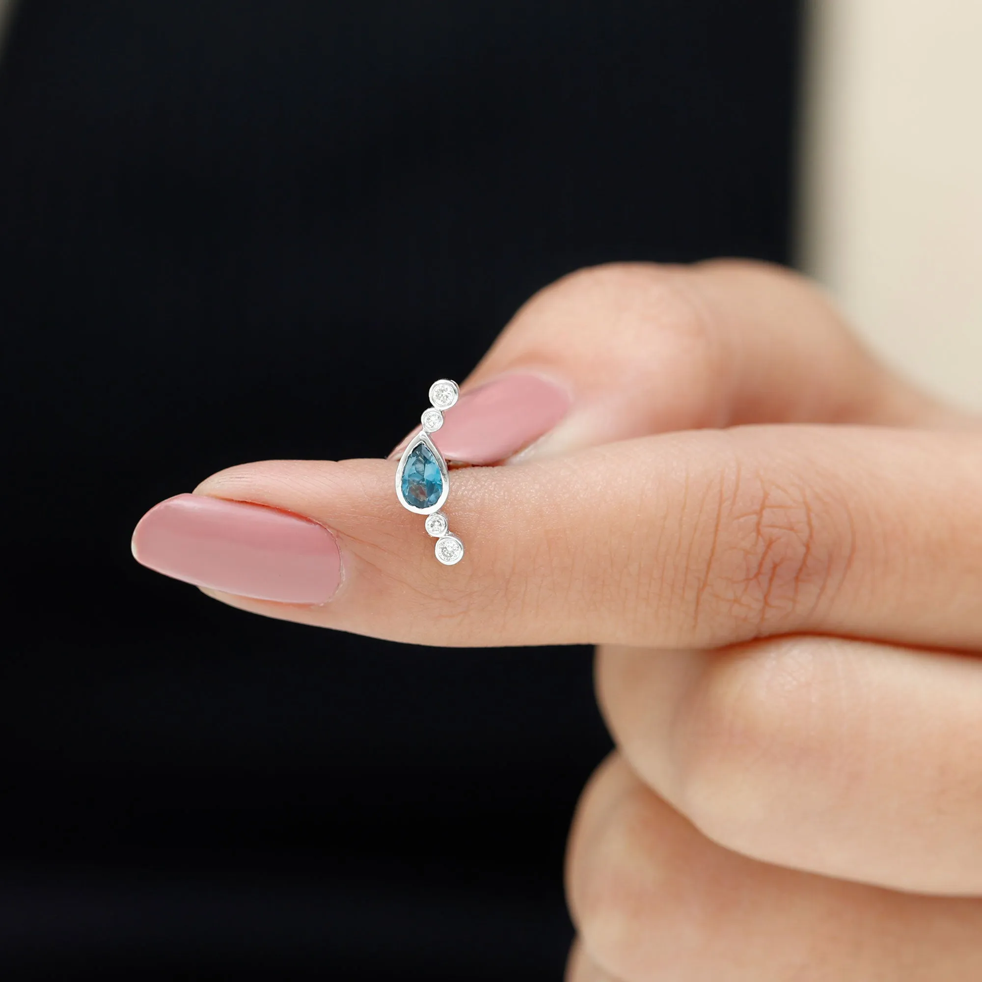 Pear London Blue Topaz Crawler Earring with Moissanite