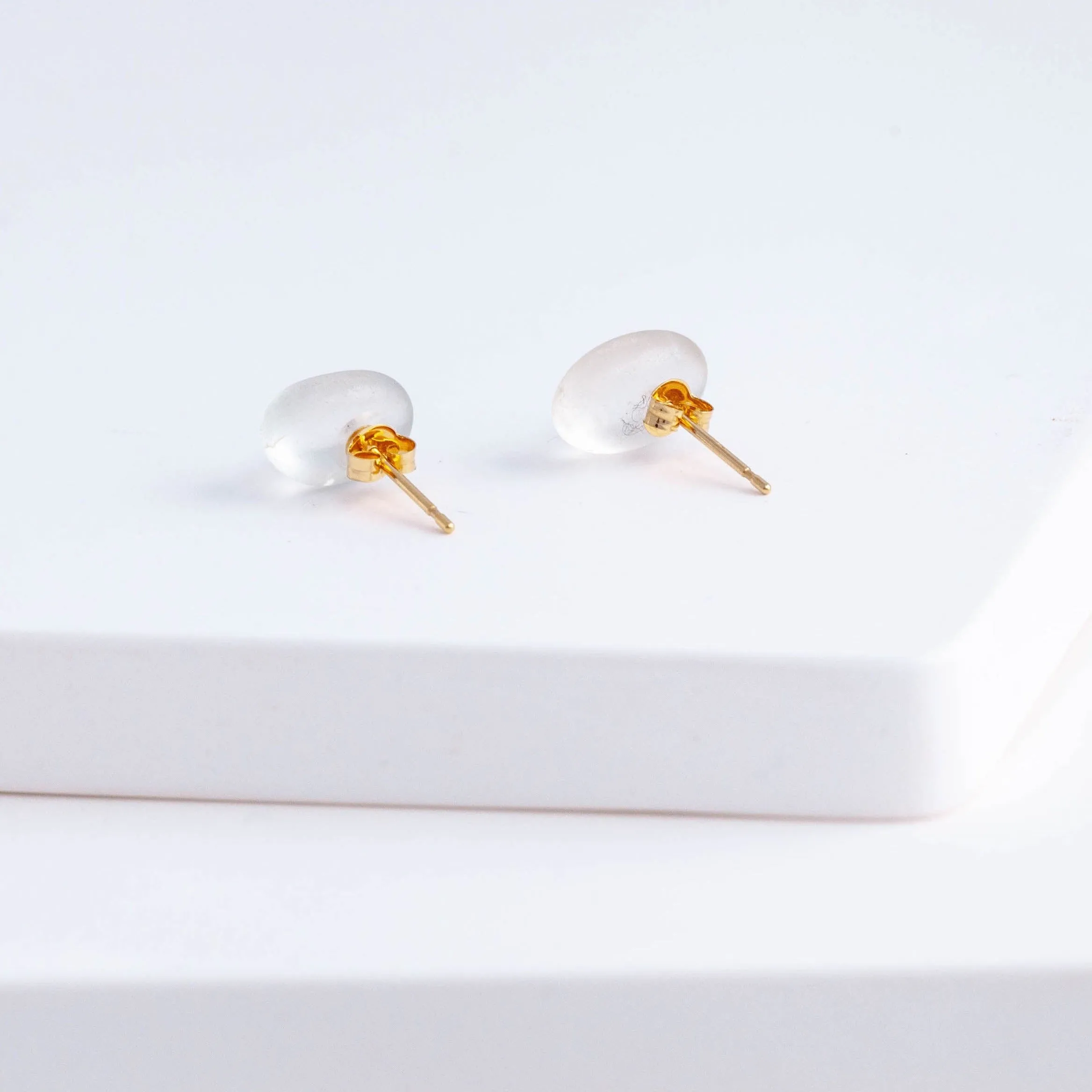 Rough stone topaz pebble stud