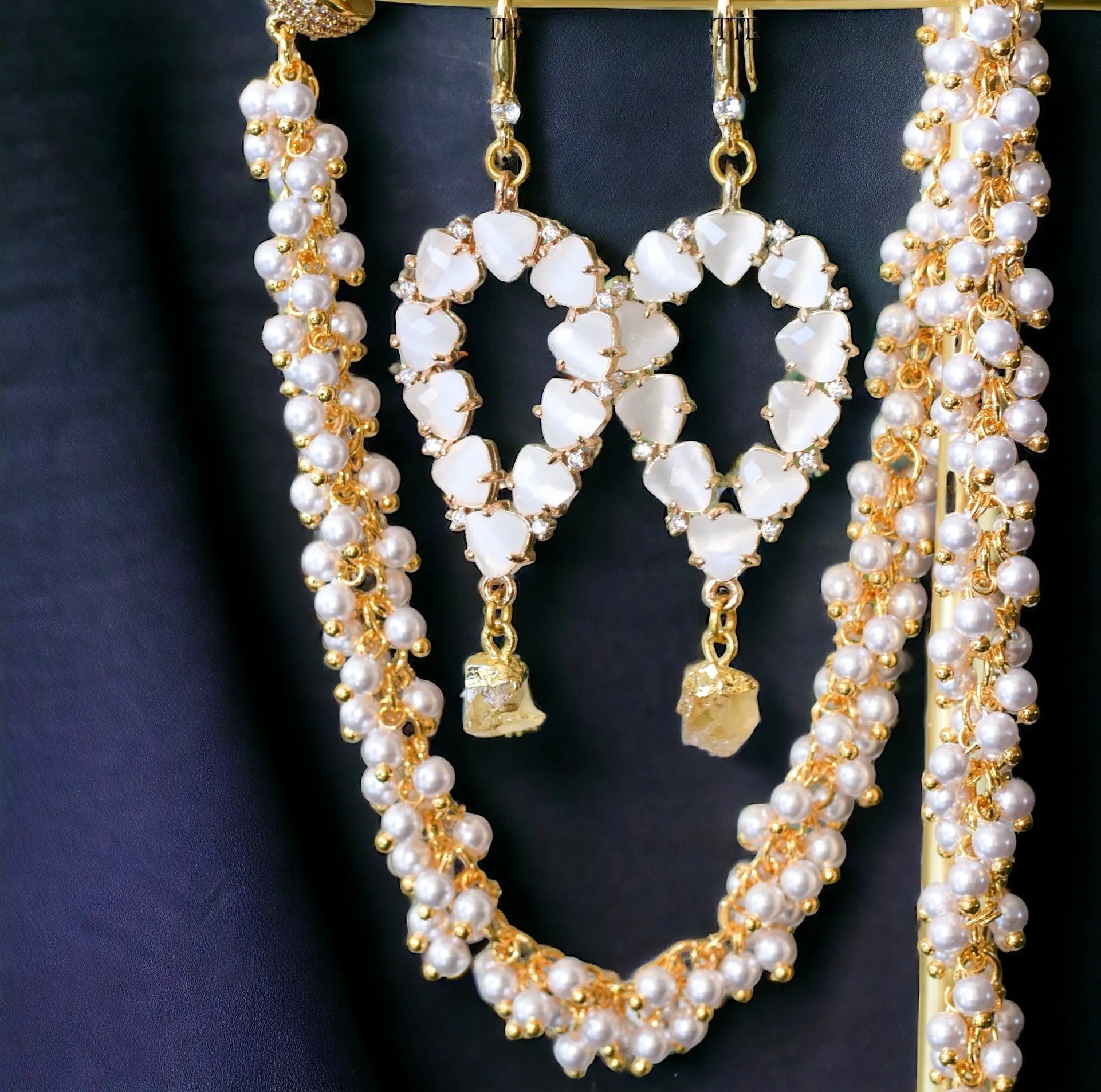 Yara white stones with gold edged sapphire drop earrings